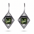 Jane Baltic Green Amber Earrings in Sterling Silver featuring genuine green Baltic amber gemstones set in polished 925 sterling silver, isolated on a white background.