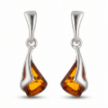 Emilia Baltic Honey Amber Earrings in Sterling Silver featuring genuine honey Baltic amber gemstones set in polished 925 sterling silver, isolated on a white background.
