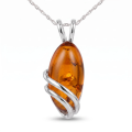 Darcie Baltic Honey Amber Pendant in Sterling Silver featuring genuine honey Baltic amber set in polished 925 sterling silver, isolated on a white background.