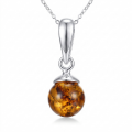 Sarah Baltic Honey Amber Pendant in Sterling Silver featuring genuine honey Baltic amber set in polished 925 sterling silver, isolated on a white background.