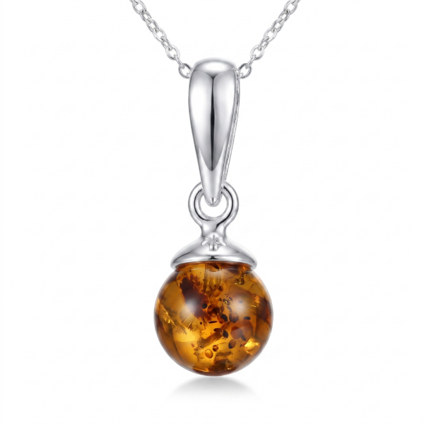 Sarah Baltic Honey Amber Pendant in Sterling Silver featuring genuine honey Baltic amber set in polished 925 sterling silver, isolated on a white background.
