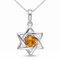 Baltic Amber Star Pendant in Sterling Silver featuring genuine Baltic amber set in a star-shaped polished 925 sterling silver design, isolated on a white background.
