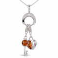 Baltic Amber Heart Pendant in Sterling Silver featuring genuine Baltic amber set in a heart-shaped polished 925 sterling silver design, isolated on a white background.