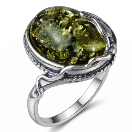 Ada Baltic Green Amber Ring in Sterling Silver featuring genuine green Baltic amber set in polished 925 sterling silver, isolated on a white background.