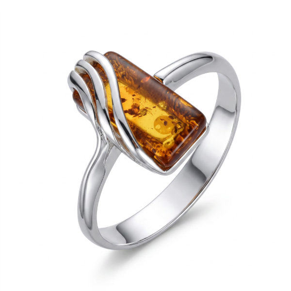 Ninelle Baltic Honey Amber Ring in Sterling Silver featuring genuine honey Baltic amber set in polished 925 sterling silver, isolated on a white background.