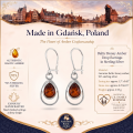 Baltic Honey Amber Drop Earrings in Sterling Silver infographic highlighting authentic honey Baltic amber, 925 sterling silver, handcrafted craftsmanship, earring dimensions, and Made in Gdańsk, Poland heritage.