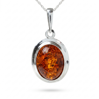 Aine Baltic Honey Amber Oval Pendant in Sterling Silver featuring genuine oval-shaped honey Baltic amber set in polished 925 sterling silver, isolated on a white background.