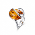 Sunshine Baltic Honey Amber Adjustable Ring in Sterling Silver featuring genuine honey Baltic amber set in polished 925 sterling silver, isolated on a white background.