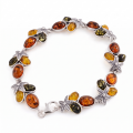 Coral Reef Baltic Amber Bracelet in Sterling Silver featuring genuine Baltic amber gemstones set in polished 925 sterling silver, isolated on a white background.