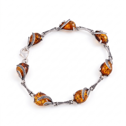 Aniela Baltic Honey Amber Bracelet in Sterling Silver featuring genuine honey Baltic amber gemstones set in polished 925 sterling silver, isolated on a white background.