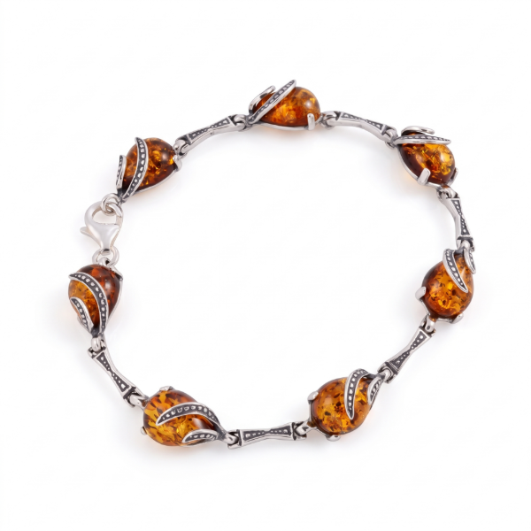 Aniela Baltic Honey Amber Bracelet in Sterling Silver featuring genuine honey Baltic amber gemstones set in polished 925 sterling silver, isolated on a white background.
