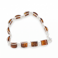Lottie Baltic Honey Amber Bracelet in Sterling Silver featuring genuine honey Baltic amber gemstones set in polished 925 sterling silver, isolated on a white background.