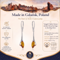 Angela Baltic Honey Amber Drop Earrings in Sterling Silver infographic highlighting authentic honey Baltic amber, 925 sterling silver, handcrafted craftsmanship, earring dimensions, and Made in Gdańsk, Poland heritage.