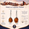 Mia Baltic Honey Amber Earrings in Sterling Silver infographic highlighting authentic honey Baltic amber, 925 sterling silver, handcrafted craftsmanship, earring dimensions, and Made in Gdańsk, Poland heritage.