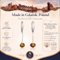 Baltic Honey Amber Drop Earrings in Sterling Silver infographic highlighting authentic honey Baltic amber, 925 sterling silver, handcrafted craftsmanship, earring dimensions, and Made in Gdańsk, Poland heritage.