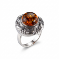 Inga Baltic Honey Amber Round Ring in Sterling Silver featuring genuine round-shaped honey Baltic amber set in polished 925 sterling silver, isolated on a white background.