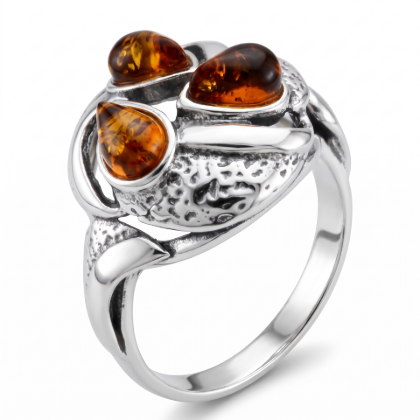Baltic Honey Amber Infinity Ring in Sterling Silver featuring genuine honey Baltic amber set in a polished 925 sterling silver infinity design, isolated on a white background.Baltic Honey Amber Infinity Ring in Sterling Silver featuring genuine honey Baltic amber set in a polished 925 sterling silver infinity design, isolated on a white background.