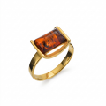 Baltic Honey Amber Ring in Gold-Plated Sterling Silver featuring genuine honey Baltic amber set in polished gold-plated 925 sterling silver, isolated on a white background.