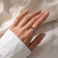 Woman wearing the Baltic Honey Amber Ring in Sterling Silver, showcasing genuine honey Baltic amber and polished 925 sterling silver in an elegant luxury jewelry lifestyle setting.
