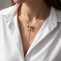 Woman wearing the Butterfly Baltic Honey Amber Necklace in Sterling Silver, showcasing genuine honey Baltic amber and polished 925 sterling silver in an elegant luxury jewelry lifestyle setting.