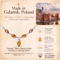 Gemma Baltic Honey Amber Necklace in Sterling Silver infographic highlighting authentic honey Baltic amber, 925 sterling silver, handcrafted craftsmanship, necklace dimensions, and Made in Gdańsk, Poland heritage.