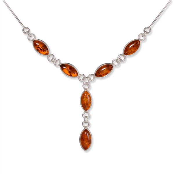 Maja Baltic Honey Amber Necklace in Sterling Silver featuring genuine honey Baltic amber set in polished 925 sterling silver, isolated on a white background.
