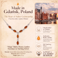 Maja Baltic Honey Amber Necklace in Sterling Silver infographic highlighting authentic honey Baltic amber, 925 sterling silver, handcrafted craftsmanship, necklace dimensions, and Made in Gdańsk, Poland heritage.