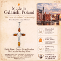 Baltic Honey Amber Cross Pendant Necklace in Sterling Silver infographic highlighting authentic honey Baltic amber, 925 sterling silver, cross design, handcrafted craftsmanship, pendant dimensions, and Made in Gdańsk, Poland heritage.