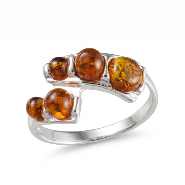Aria Baltic Honey Amber Ring in Sterling Silver featuring genuine honey Baltic amber set in polished 925 sterling silver, isolated on a white background.