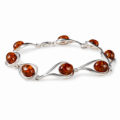 Adriana Baltic Honey Amber Bracelet in Sterling Silver featuring genuine honey Baltic amber gemstones set in polished 925 sterling silver, isolated on a white background.