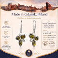 Martina Baltic Green Amber Earrings in Sterling Silver infographic highlighting authentic green Baltic amber, 925 sterling silver, handcrafted craftsmanship, earring dimensions, and Made in Gdańsk, Poland heritage.            1/2