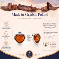 Hearts Baltic Honey Amber Stud Earrings in Sterling Silver infographic highlighting authentic honey Baltic amber, 925 sterling silver, heart design, handcrafted craftsmanship, earring dimensions, and Made in Gdańsk, Poland heritage.