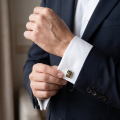 Baltic Green Amber Cufflinks in Sterling Silver infographic highlighting authentic green Baltic amber, 925 sterling silver, handcrafted craftsmanship, cufflink dimensions, and Made in Gdańsk, Poland heritage.