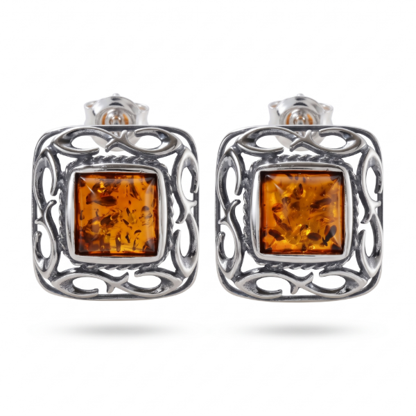 Ruth Baltic Honey Amber Stud Earrings in Sterling Silver featuring genuine honey Baltic amber gemstones set in polished 925 sterling silver, isolated on a white background.