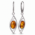 Pair of “Autumn” Baltic Honey Amber Drop Earrings in Sterling Silver on a white background.