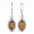 Pair of “Alvina” Baltic Honey Amber Drop Earrings in Sterling Silver on a white background.