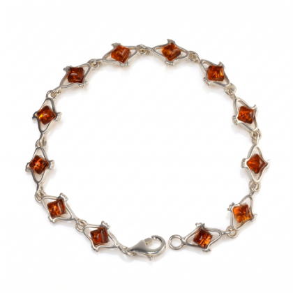 “Laura” Baltic Honey Amber Bracelet in Sterling Silver displayed on a white background.