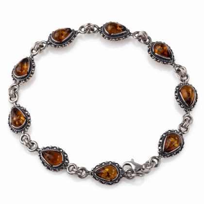 “Bajena” Baltic Honey Amber Bracelet in Sterling Silver displayed on a white background.