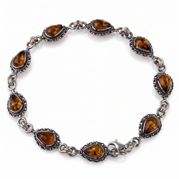 “Bajena” Baltic Honey Amber Bracelet in Sterling Silver displayed on a white background.