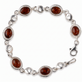 “Alison” Baltic Honey Amber Bracelet in Sterling Silver displayed on a white background.
