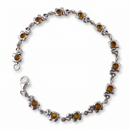 “Elephants” Baltic Honey Amber Bracelet in Sterling Silver displayed on a white background.