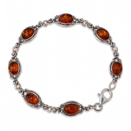 “Kim” Baltic Honey Amber Bracelet in Sterling Silver displayed on a white background.