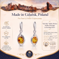 1. Baltic Honey Amber Earrings in Sterling Silver infographic showing the earrings, materials, and product details.