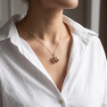 Baltic Amber Heart Pendant in Sterling Silver displayed on a white background.